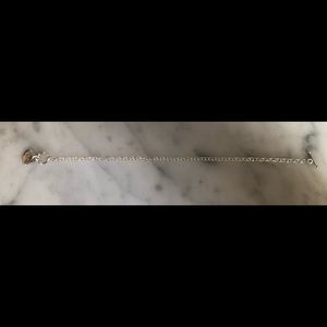 8 inch silver 925 stamped believe bracelet.